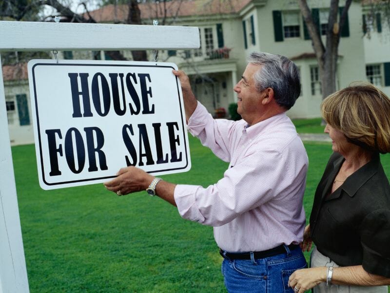 Couple put a sign House For Sale